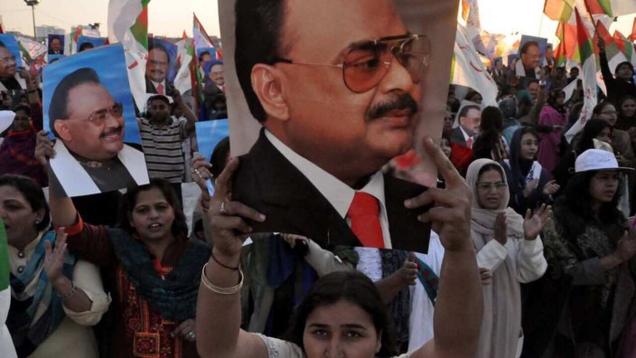Supporters of Pakistani MQM party hold portraits of party leader Altaf Hussain in Karachi, Pakistan, 05 January 2014