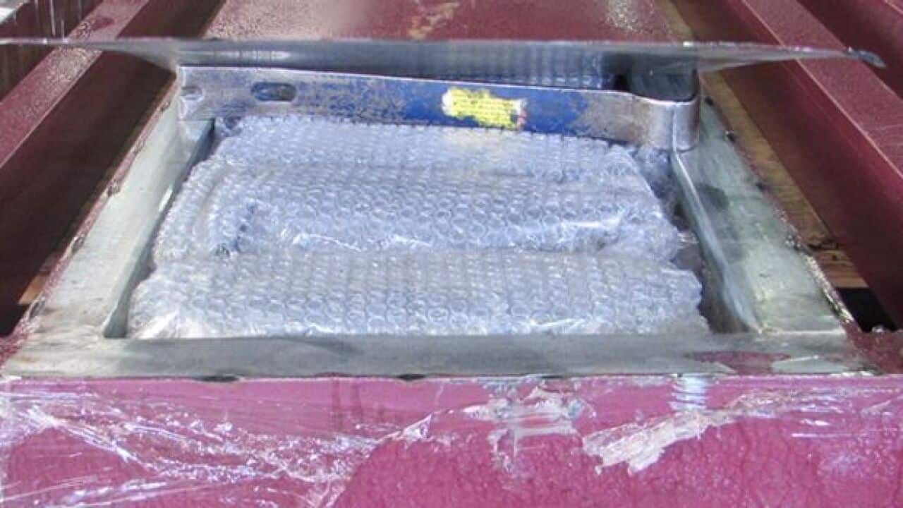 Police have seized 300 kilograms of ice hidden in a shipment of large metal gates transported from China.