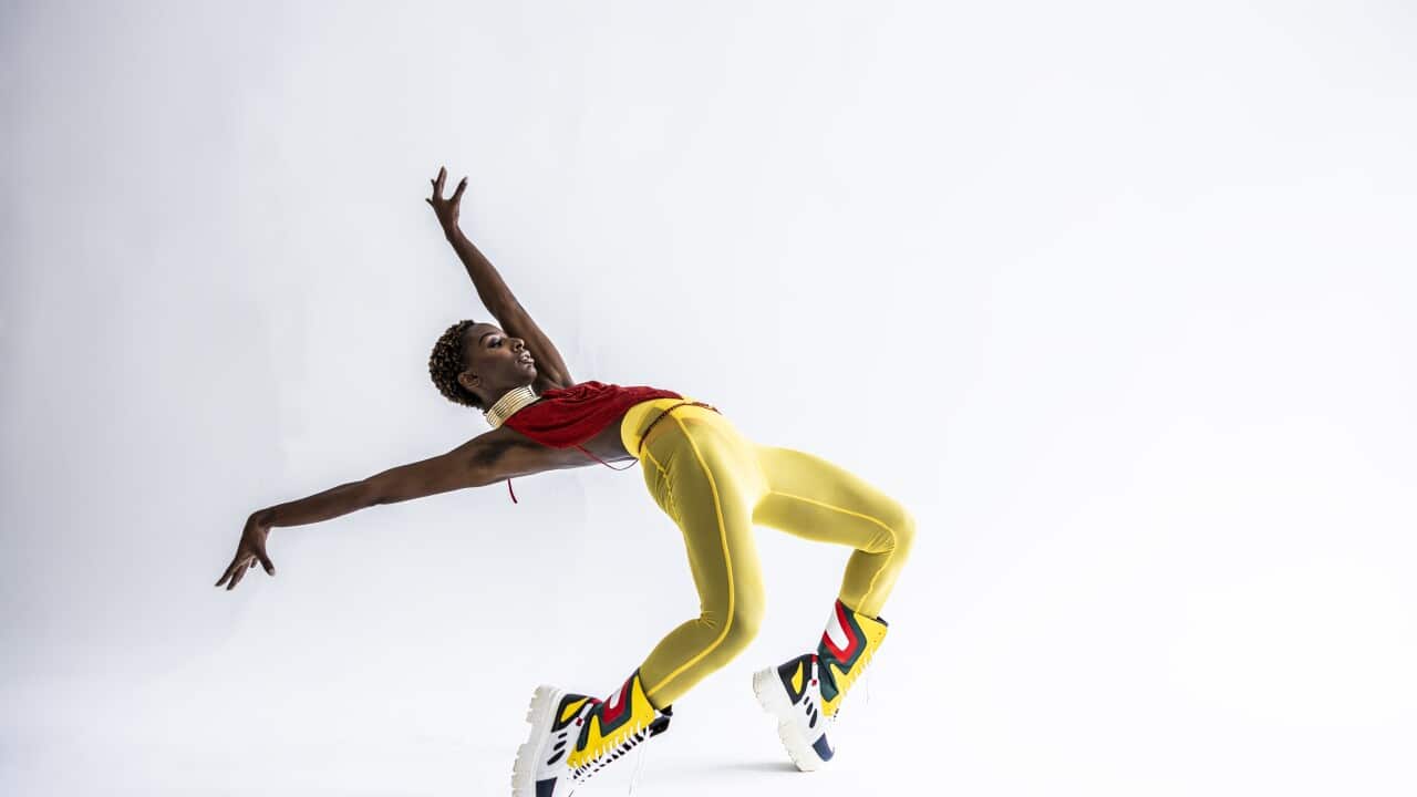Studio portrait of fashionable female professional dancer