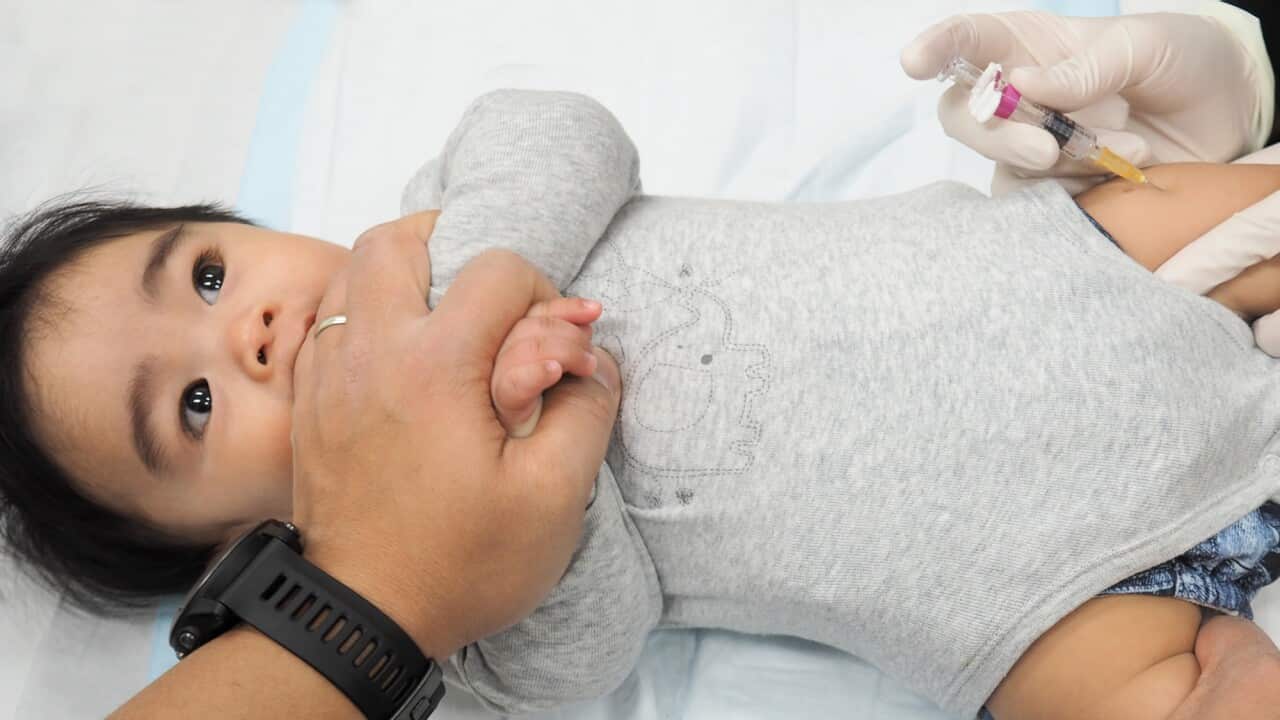 Baby getting his six months vaccination