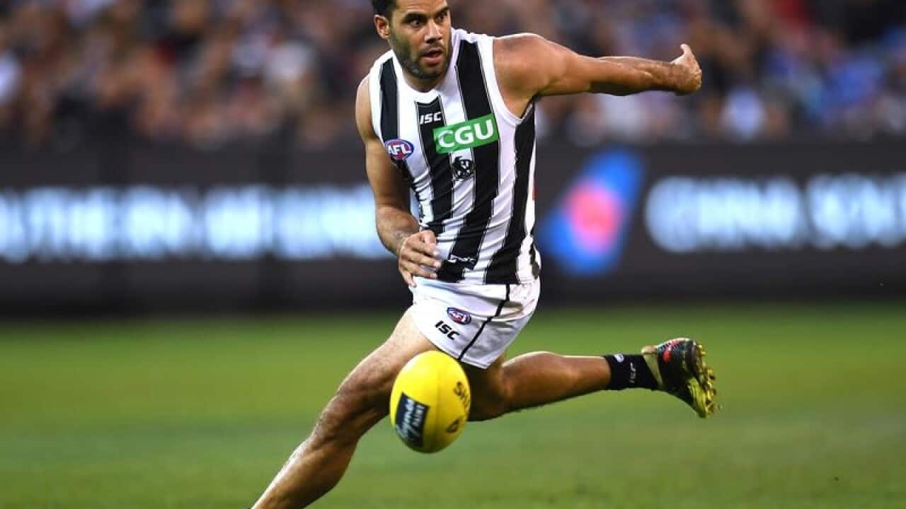 Daniel Wells of the Magpies is seen in action