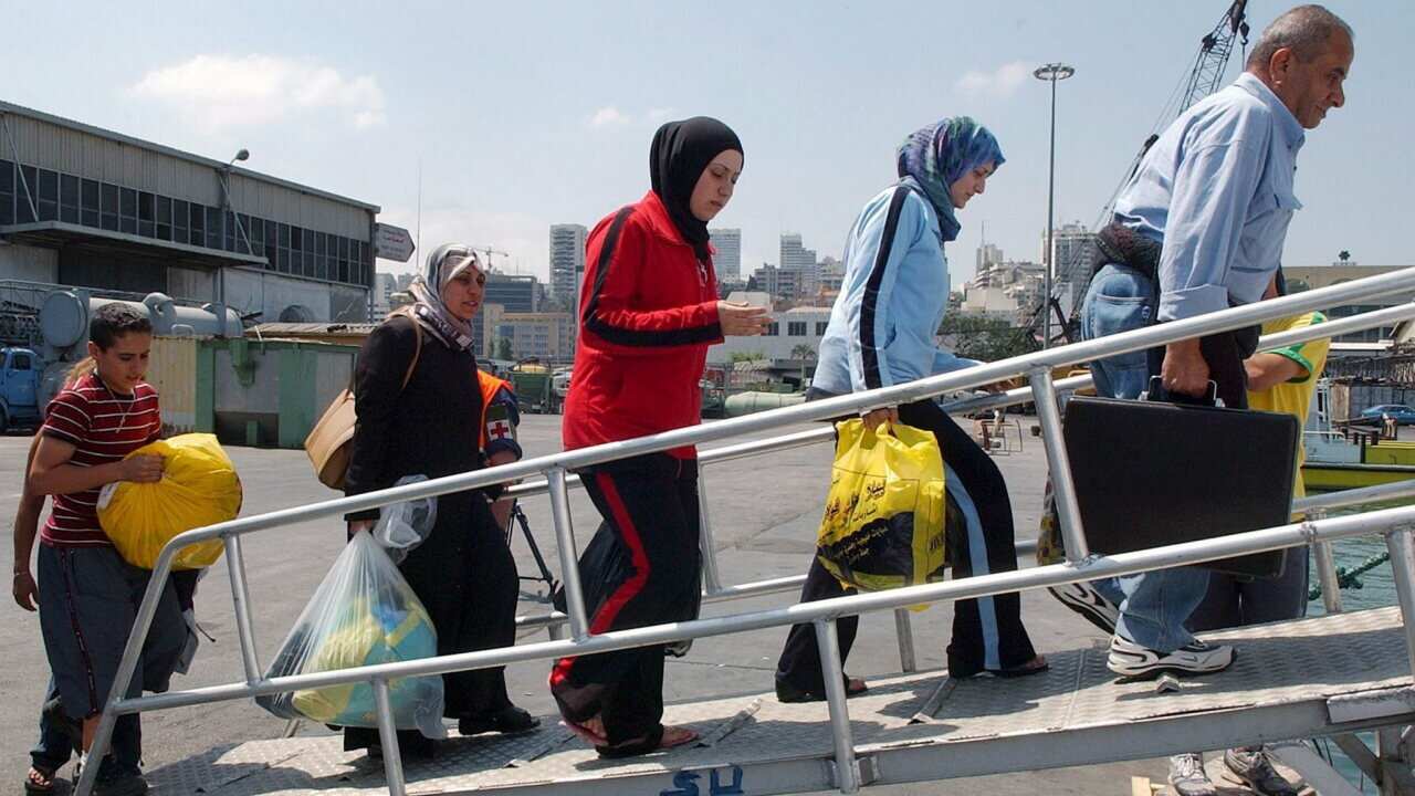 Lebanese Australians being evacuated from Beirut with the help of the Australian embassy in 2006 - AAP-1.jpg