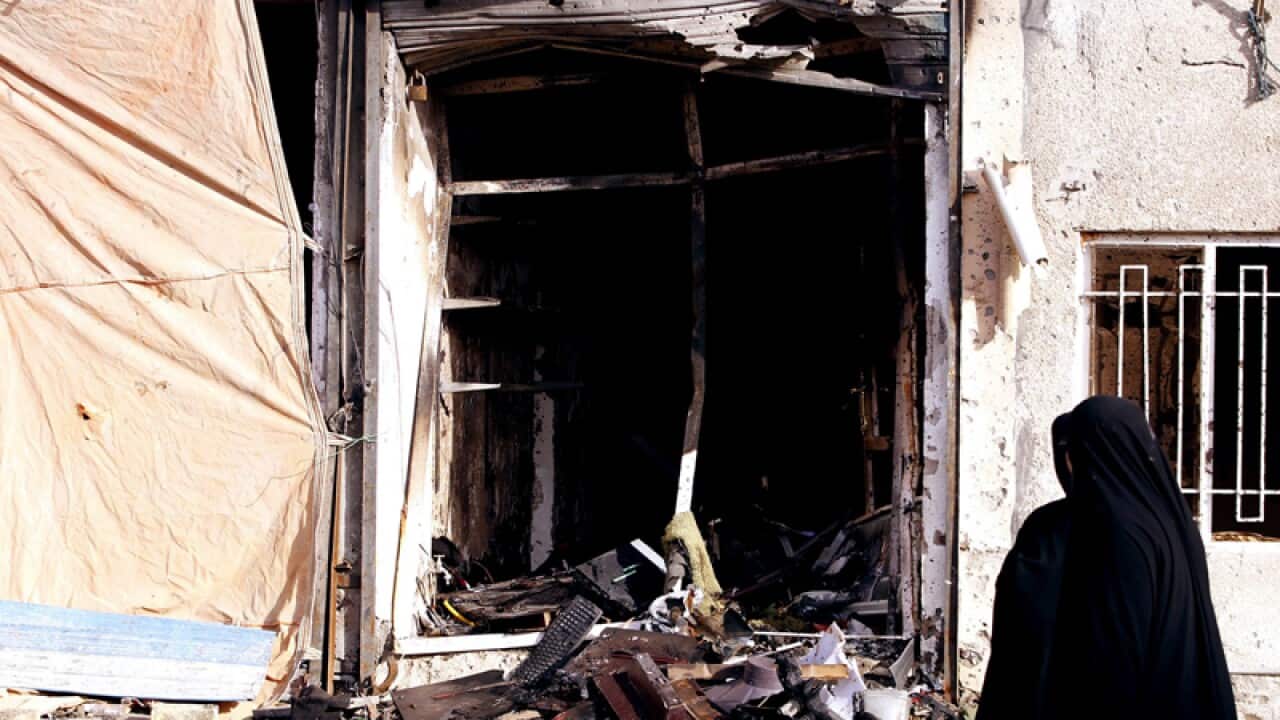 Attacks kill 18 as Iraqis slam govt