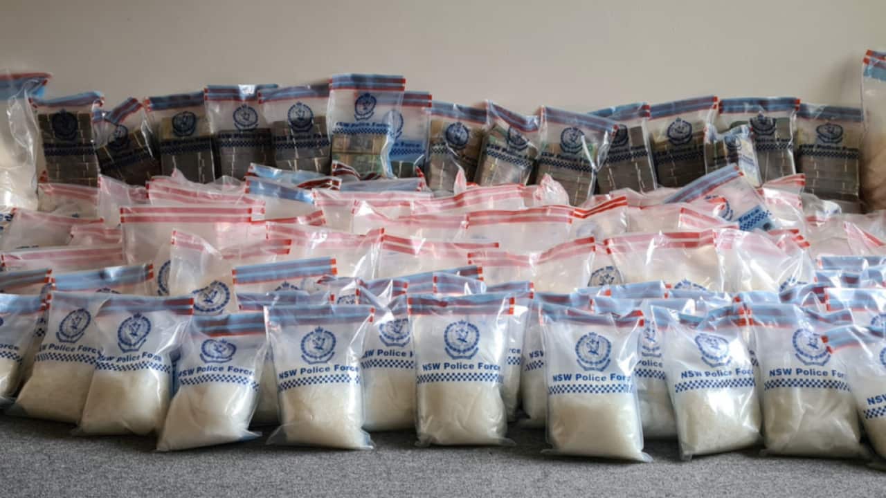 A leaking toilet pipe led to the discovery of $1.1 million in cash and 220 kilograms of ice in Sydney’s south-west.