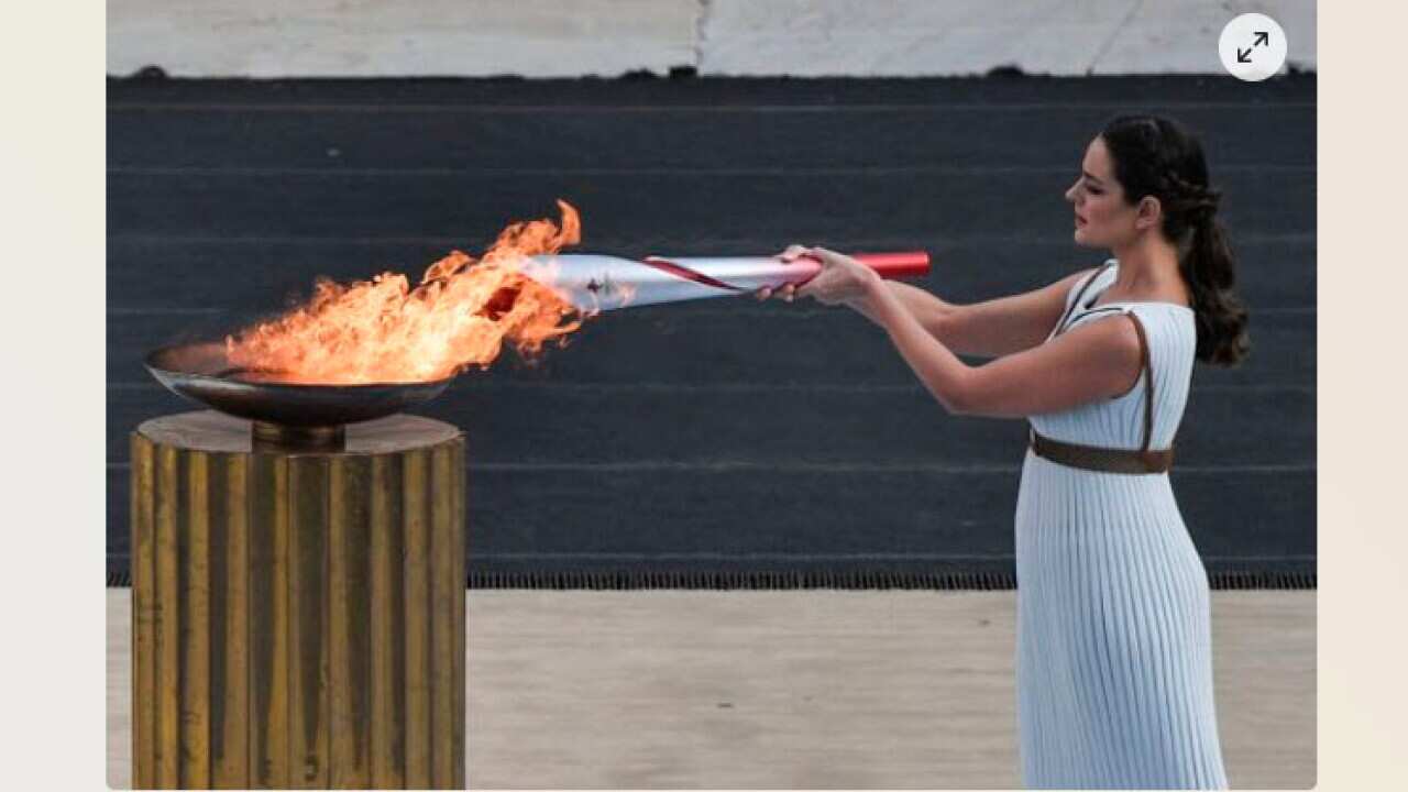 La flamme olympique - AFP.jpg