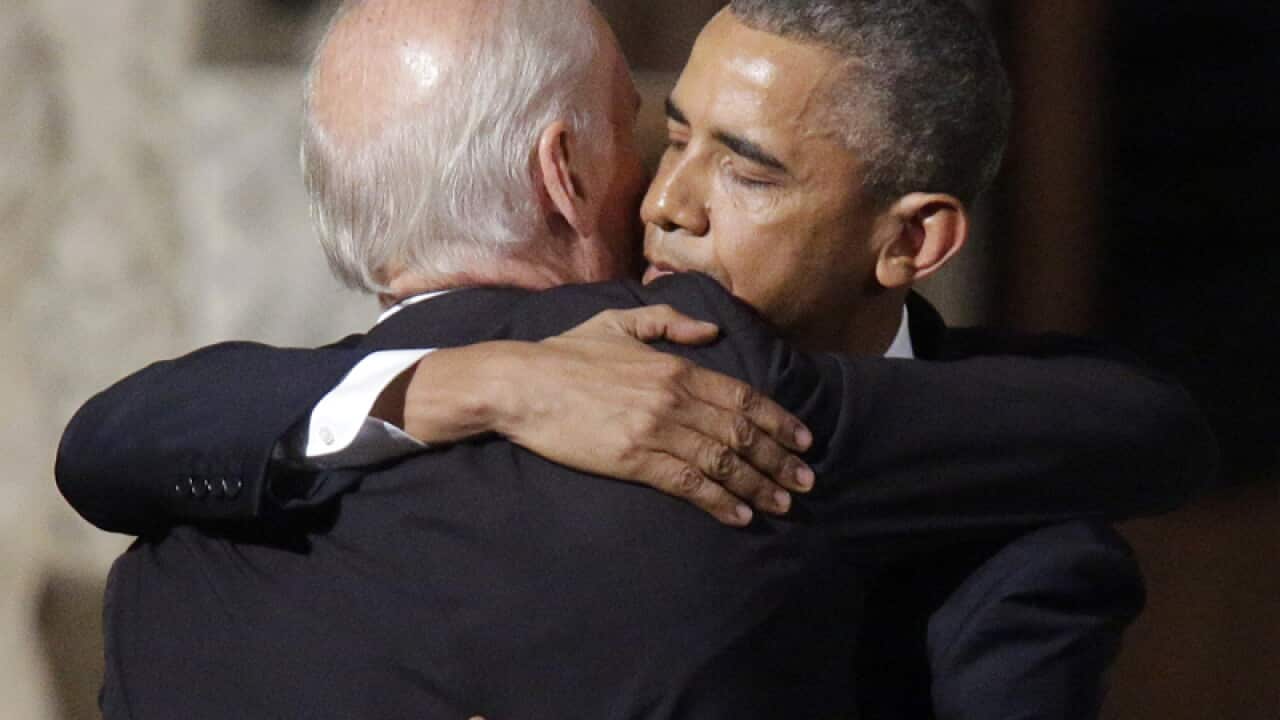 Vice President Joe Biden shares a hug with President Barack Obama