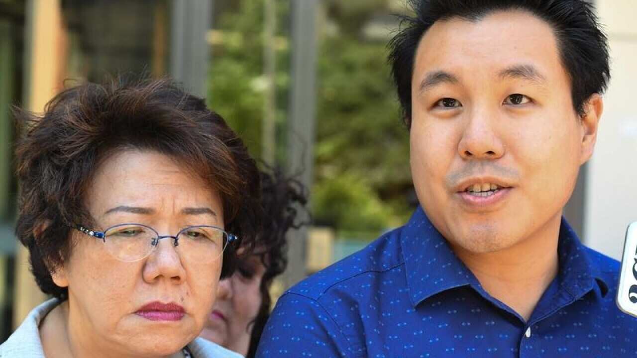 Curtis Cheng's widow, Selina Cheng and their son Alpha speak to media