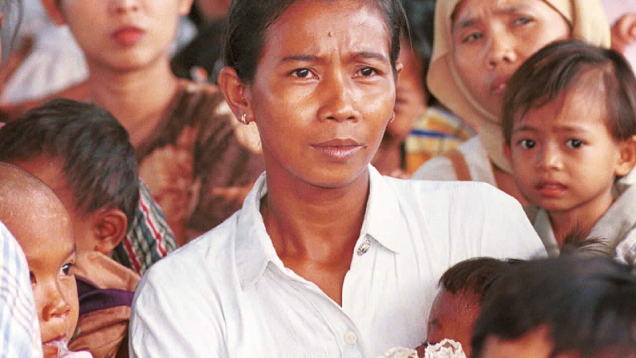 Poor Indonesian mothers with their children