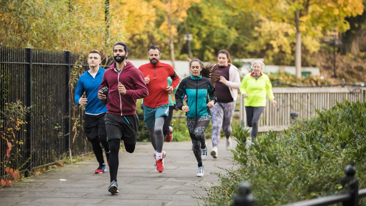Group Of Friends Running Together a