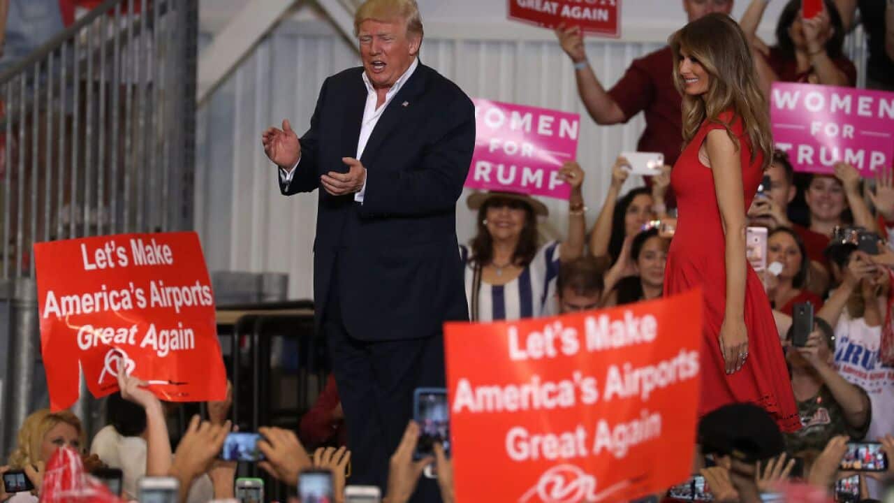 President Donald Trump arrives for a campaign rally at the AeroMod International hangar at Orlando Melbourne International Airport on February 18, 2017 in Melbourne, Florida.