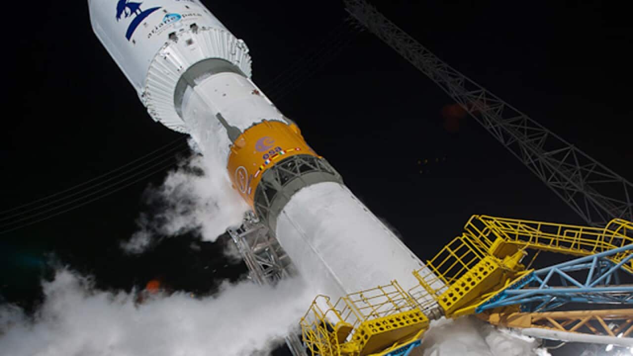 The preparation of the launch of a rocket containing a satellite