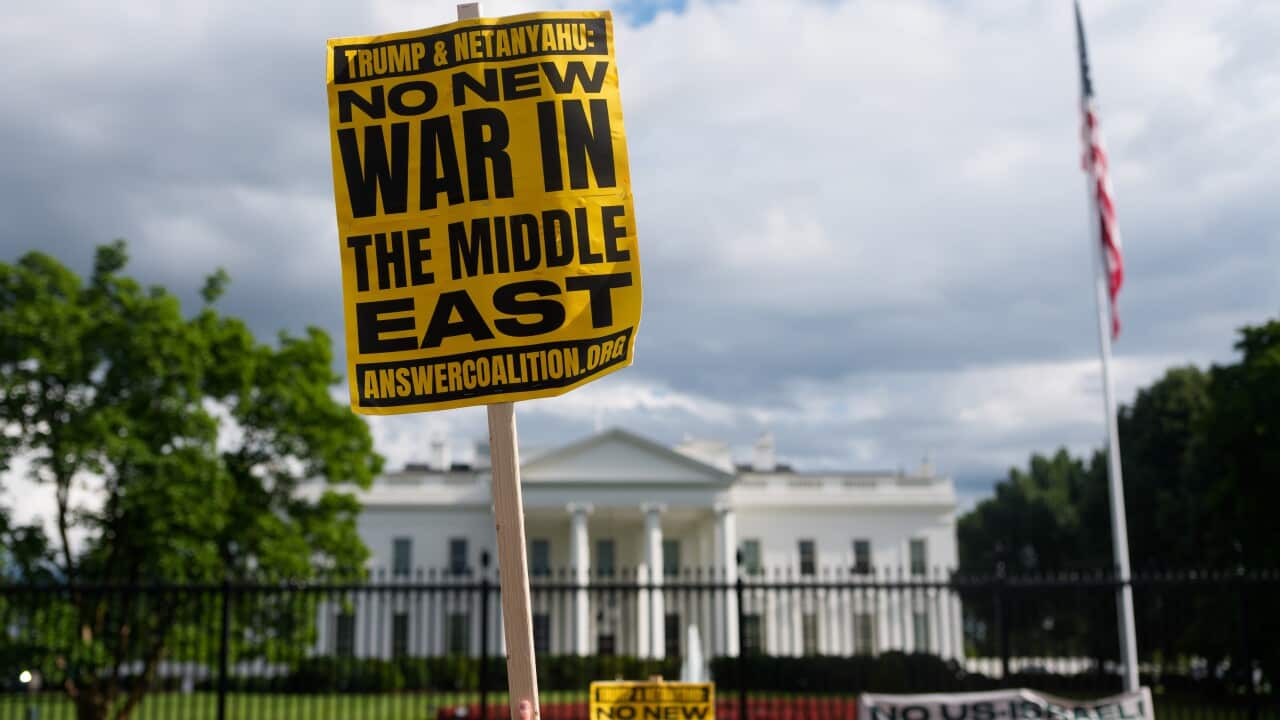 DC: Workers construct a 100-foot flag pole on the North Lawn of the White House