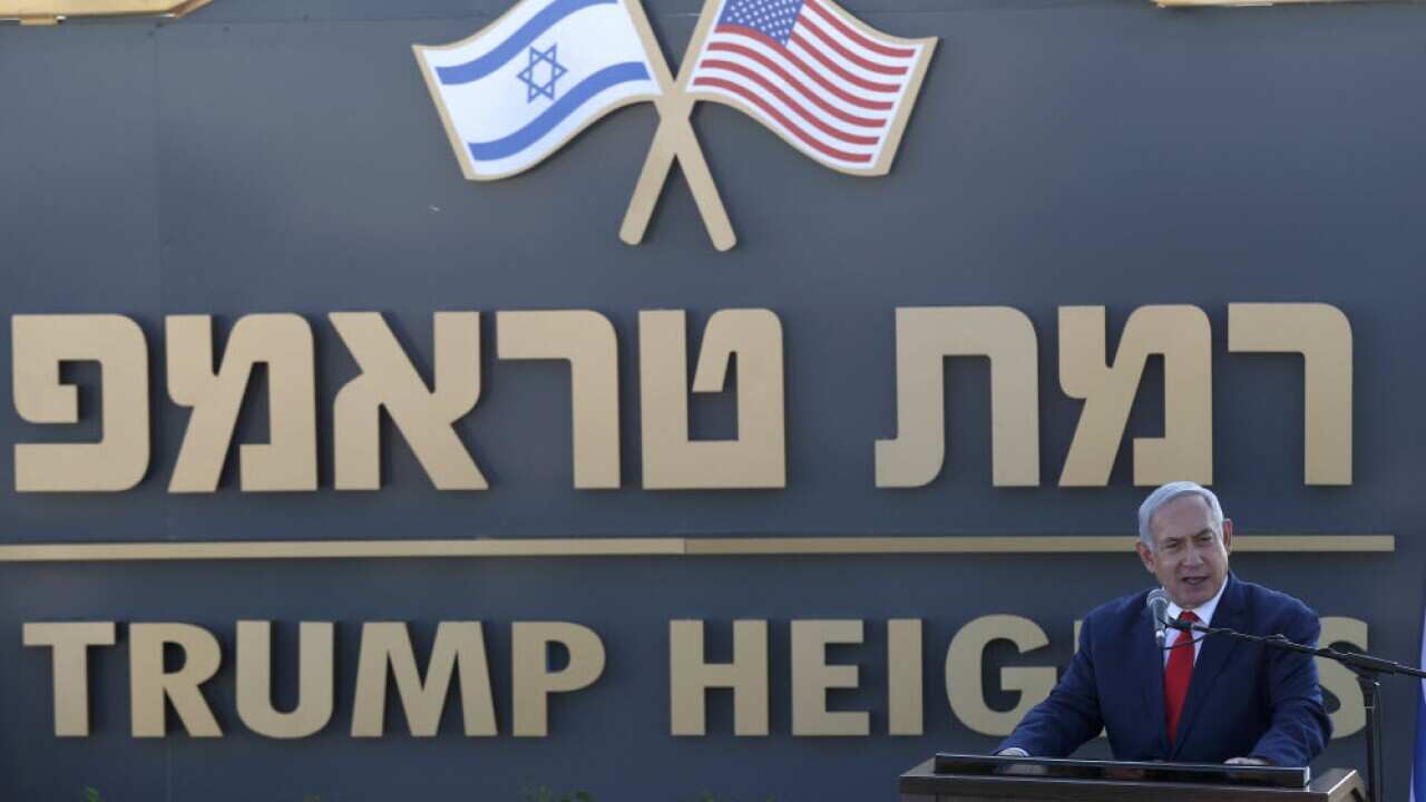 Israeli Prime Minister Benjamin Netanyahu at the unveiling of the new "Trump Heights" settlement