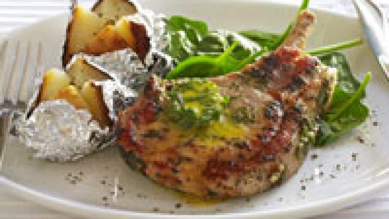 Pork cutlets with jacket potatoes and sage butter