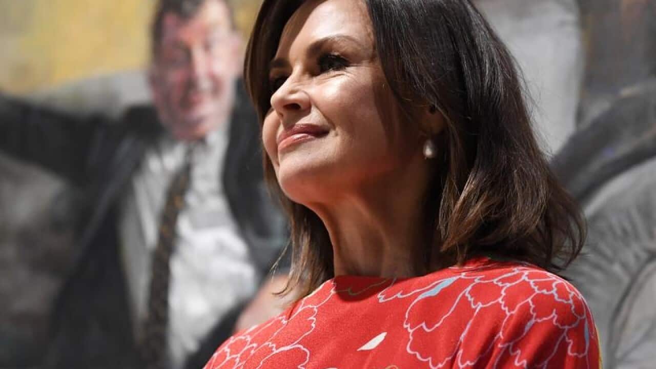Journalist and television personality Lisa Wilkinson looks on