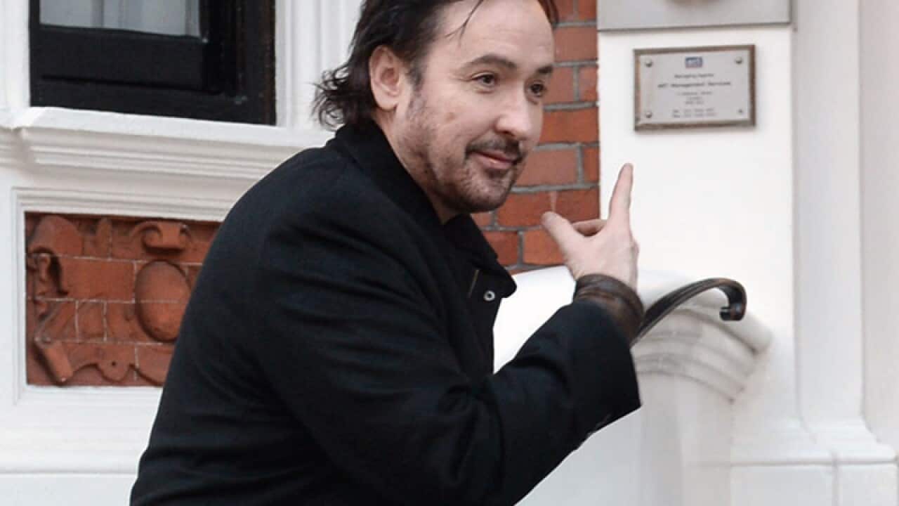 John Cusack arrives at the Ecuadorian Embassy in London