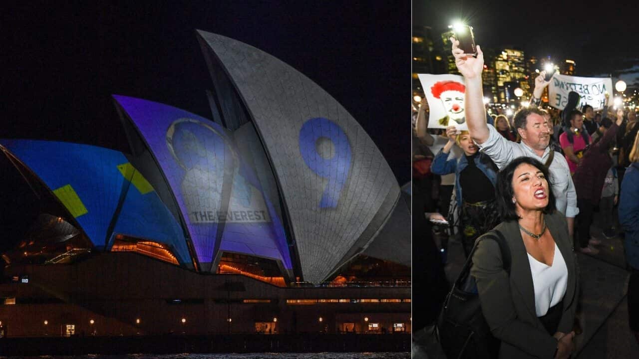 Demonstrators are seen protesting against the promotion at the Opera House
