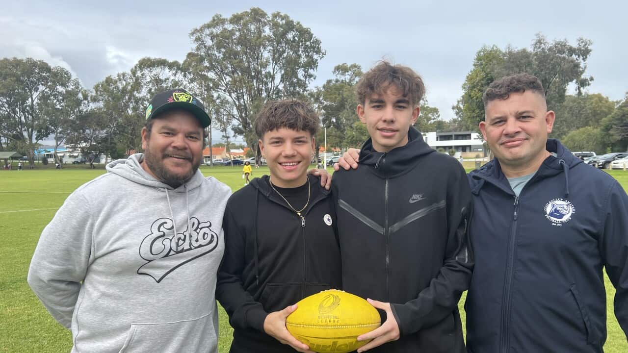 Father sons uniting through football.jpg