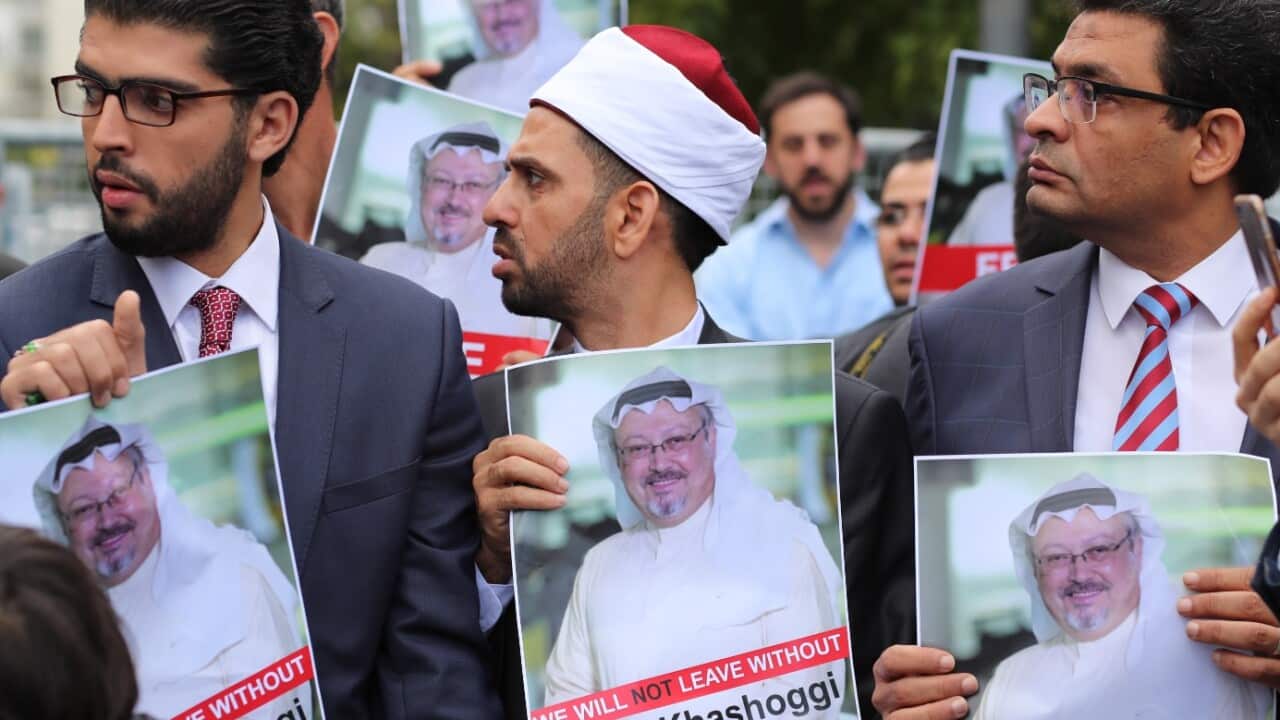 Protesters hold pictures of missing Saudi journalist Jamal Khashoggi during a demonstration organized by Turkish-Arabic Media Association