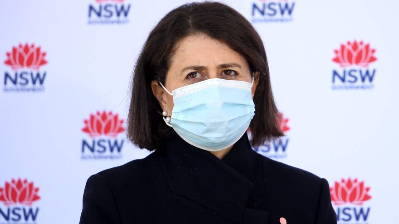 NSW Premier Gladys Berejiklian looks on during a press conference in Sydney