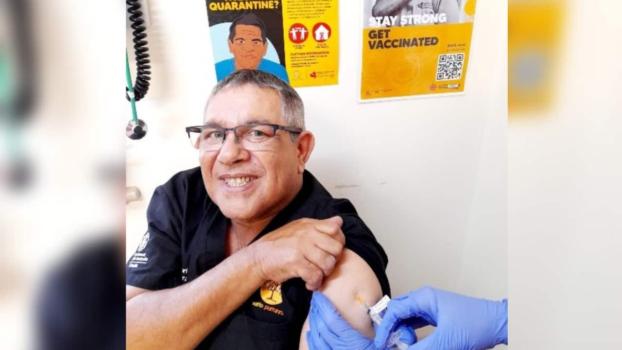 Watto Purrunna Aboriginal Health Clinic worker Adrian Coulthard getting vaccinated in one of the dedicated bays