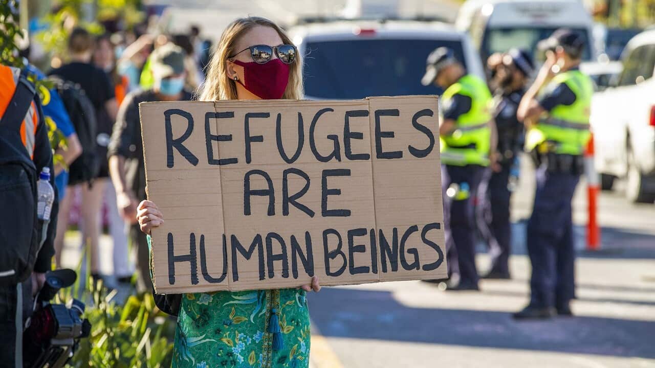 Protesters gather to support asylum seekers detained at the Kangaroo Point Central Hotel in Brisbane.