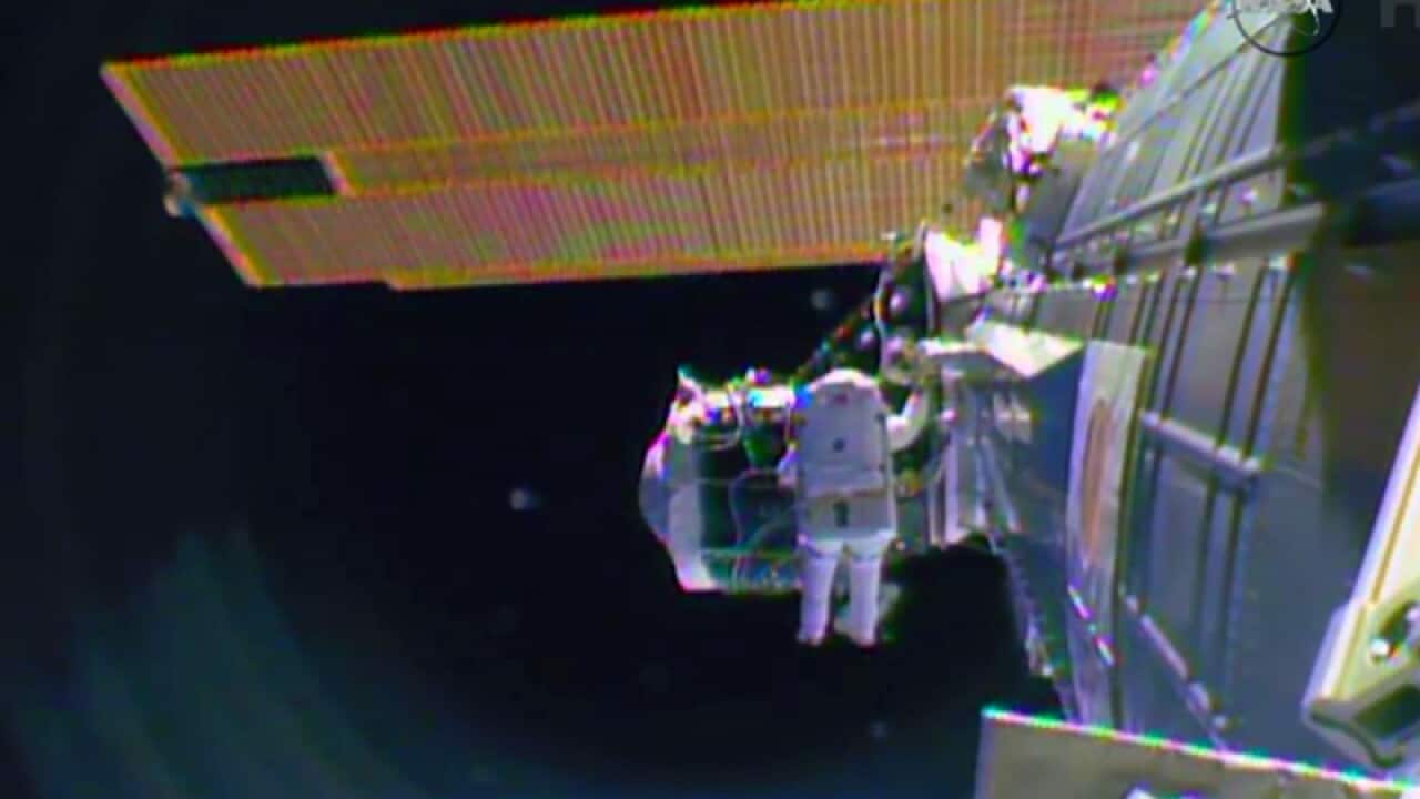 astronaut Barry "Butch" Wilmore begins the spacewalk