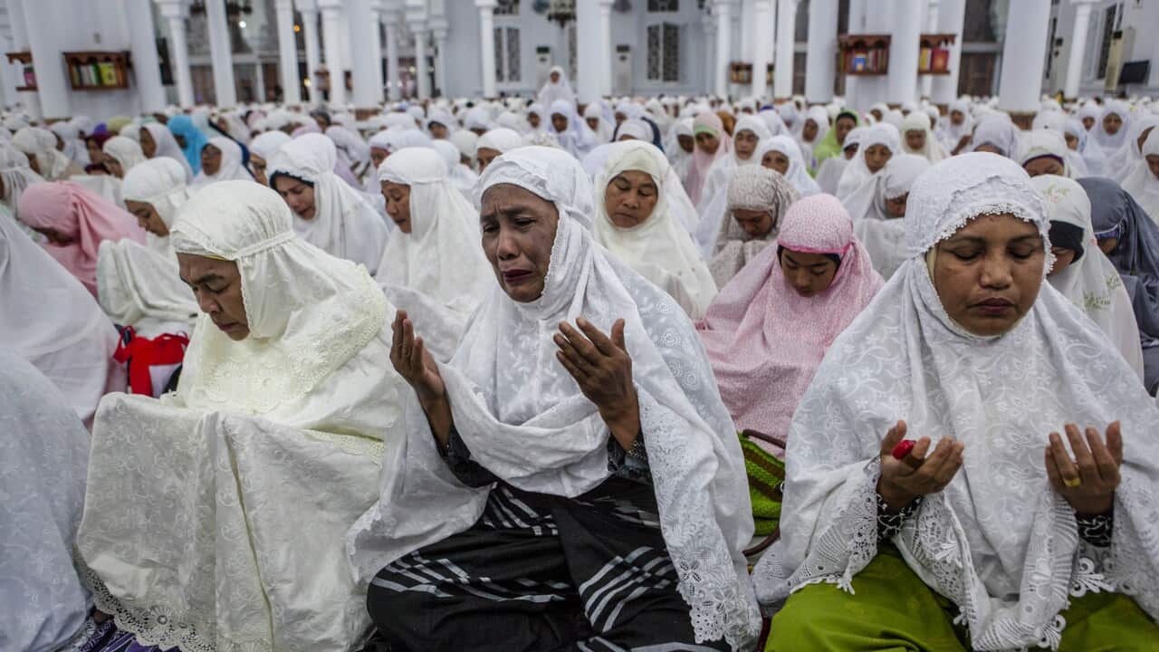 Acehnese women attend a collective zikr to commemorate the 10th anniversary of tsunami at Baiturrahman grand mosque in Banda Aceh, Indonesia. (Getty)