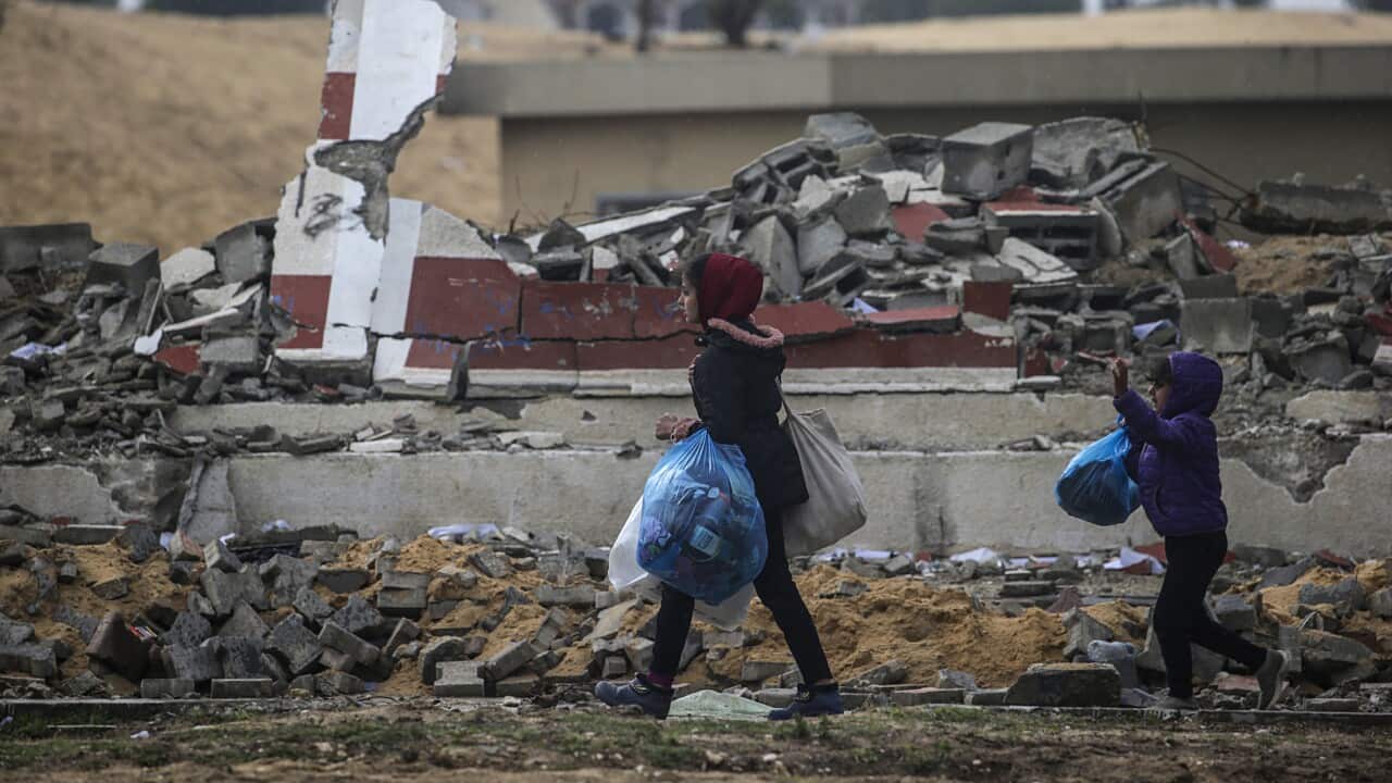 Children walking in Gaza