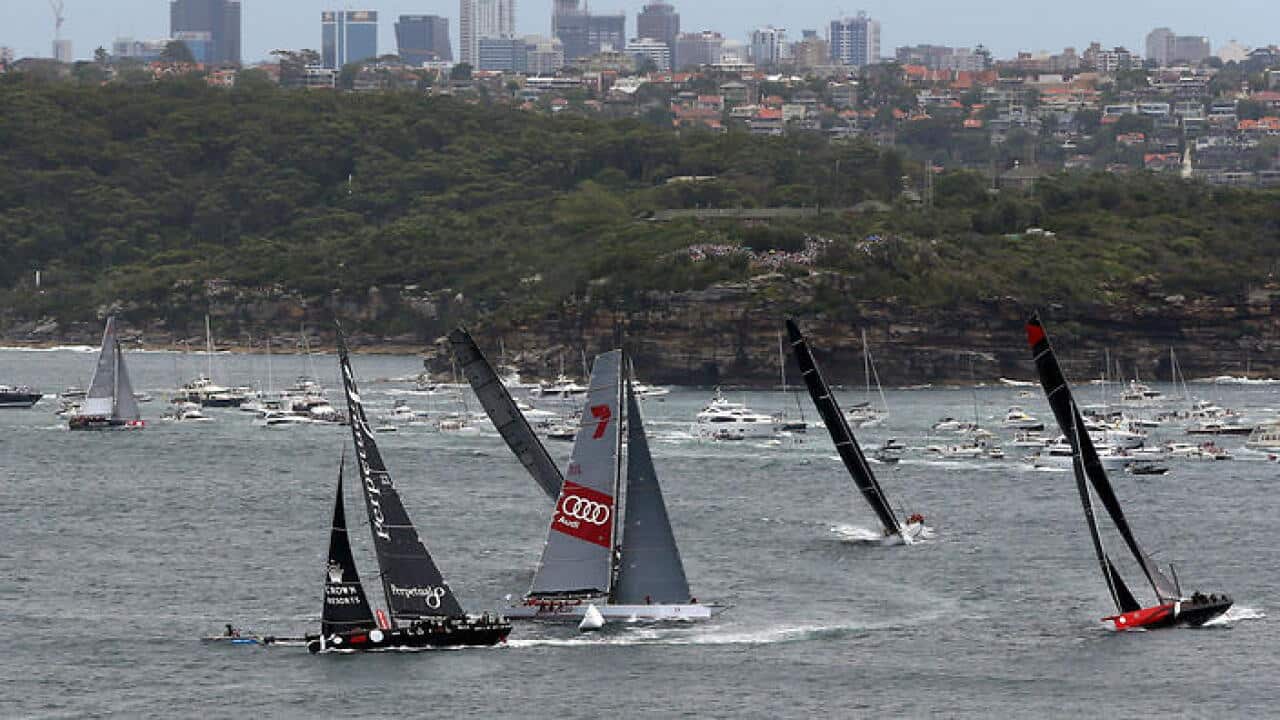 Front contending yachts sail through North Head in Sydney during the 71st Rolex Sydney to Hobart yacht race in Sydney on Saturday, Dec. 26, 2015. (AAP Image/Jane dempster) NO ARCHIVING