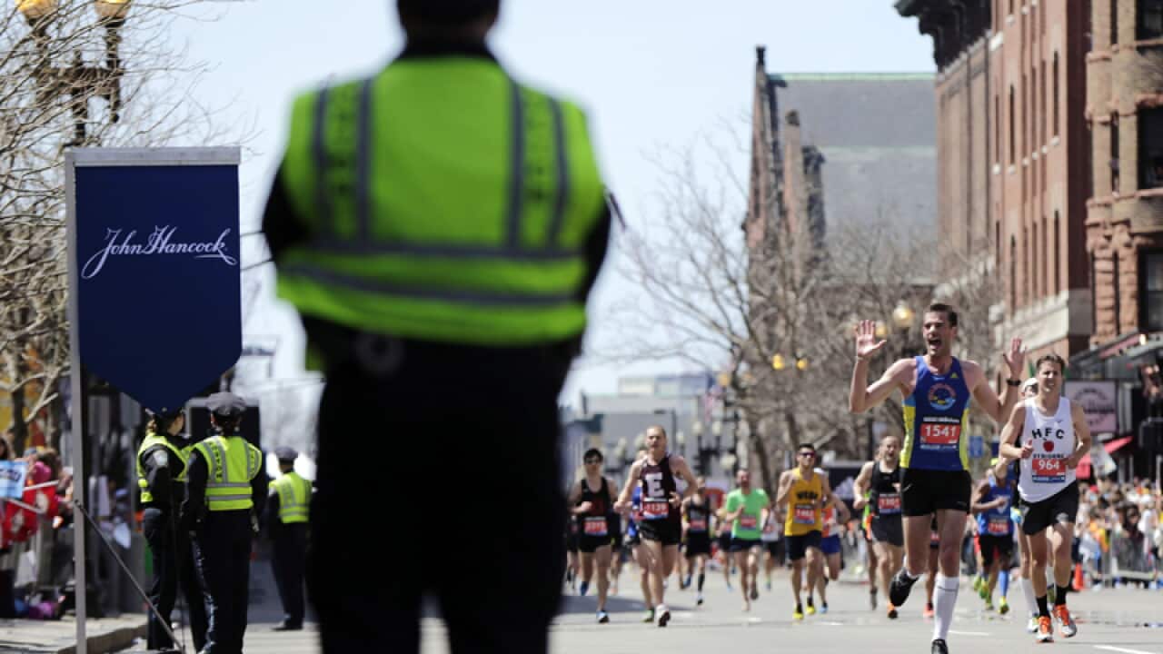A Police officer during the 118th Boston Marathon in Boston.