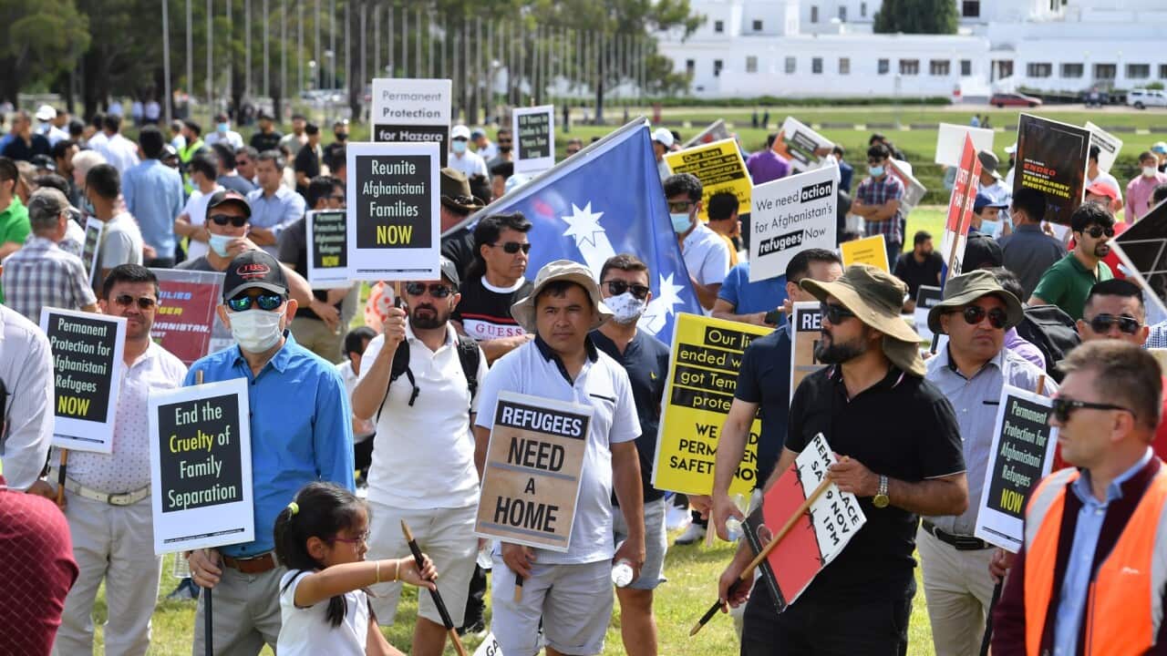 Refugees and people seeking asylum from Afghanistan rally ro protest outside Parliament House in Canberra, Tuesday, February 8, 2022. (AAP Image/Mick Tsikas) NO ARCHIVING