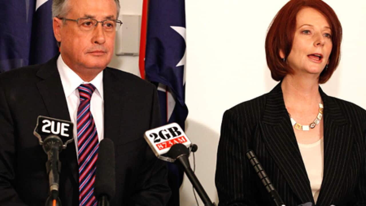 swan_gillard_presser_100628_B_getty_2020599545