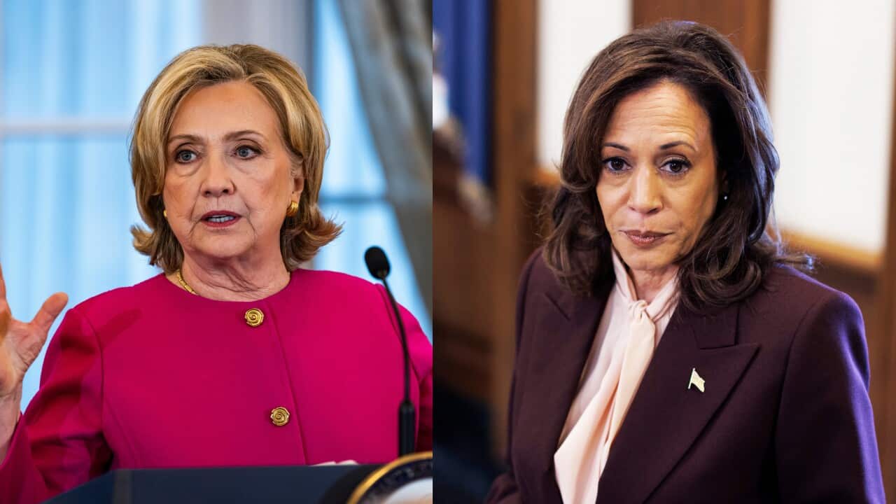Hillary Clinton, wearing a bright pink blazer, speaks at an event with a microphone in front of her, gesturing with her hand. Kamala Harris, dressed in a dark burgundy blazer and cream blouse, looks serious while attending a formal event. Both women are in indoor settings with elegant backgrounds.
