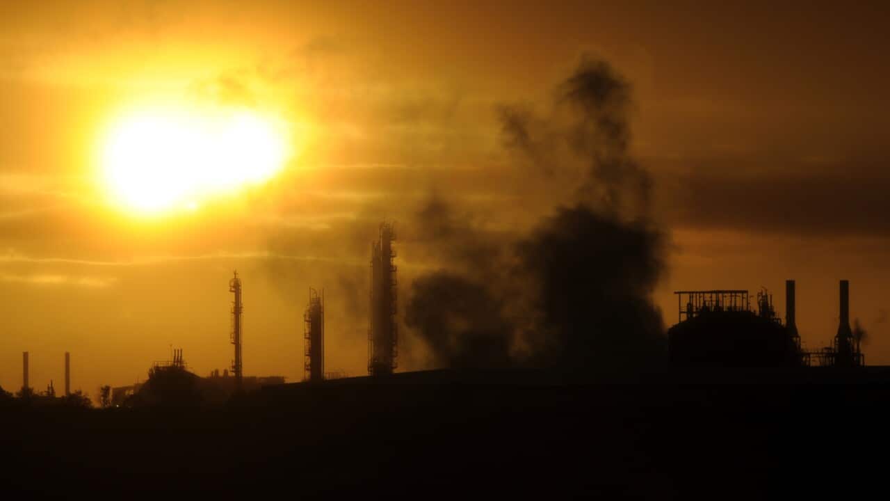 Steam and other emissions rise from an industrial plant in Melbourne, Tuesday, April 29, 2014. The Abbott government's pledge to remove the carbon tax will be tested when the new Senate is formed after July 1. (AAP Image/Julian Smith) NO ARCHIVING