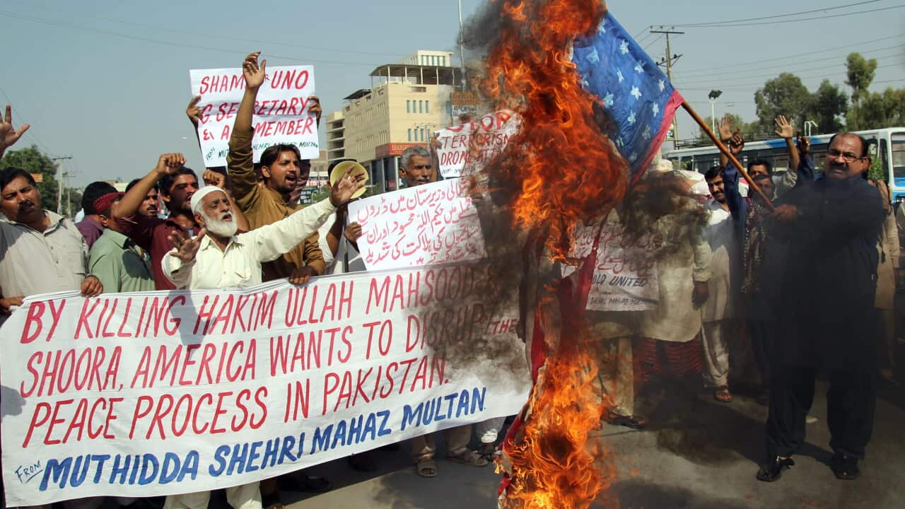 Pakistanis protest against the killing of Taliban leader Hakimullah Mehsud in a US drone attack. Getty .jpg