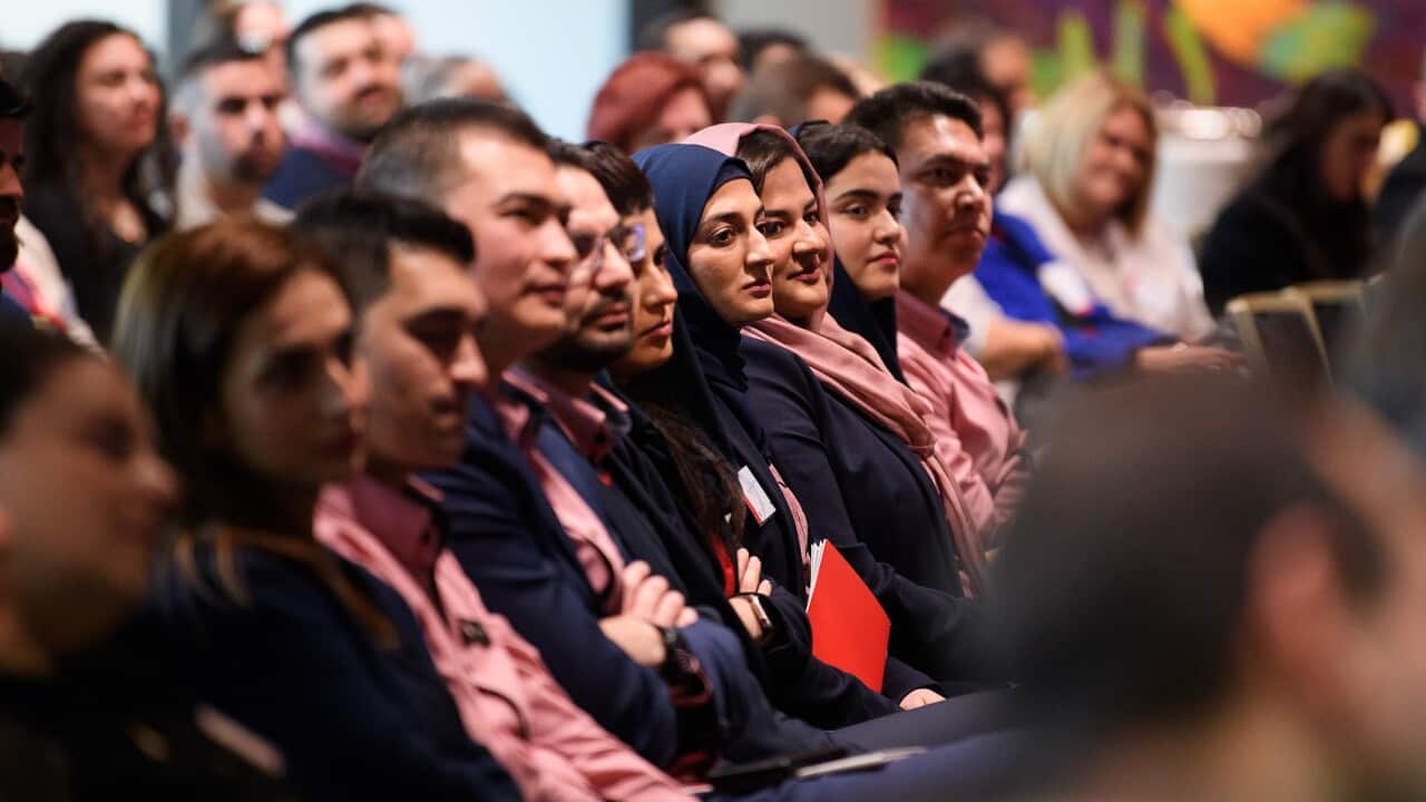 Attendees during the June 2023 graduation of 24 refugees who have completed internships with Service NSW in Sydney (AAP).