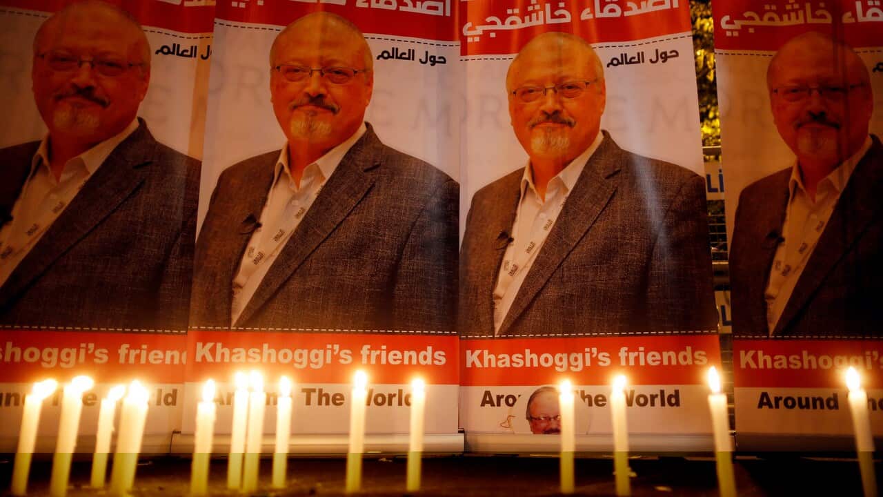 Candles, lit by activists, protesting the killing of Saudi journalist Jamal Khashoggi, are placed outside Saudi Arabia's consulate, in Istanbul.