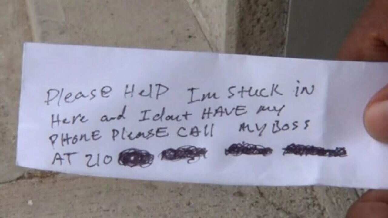 Handwritten note passed by trapped ATM worker