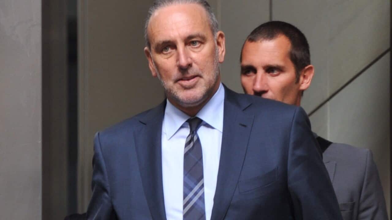 Brian Houston wearing a suit