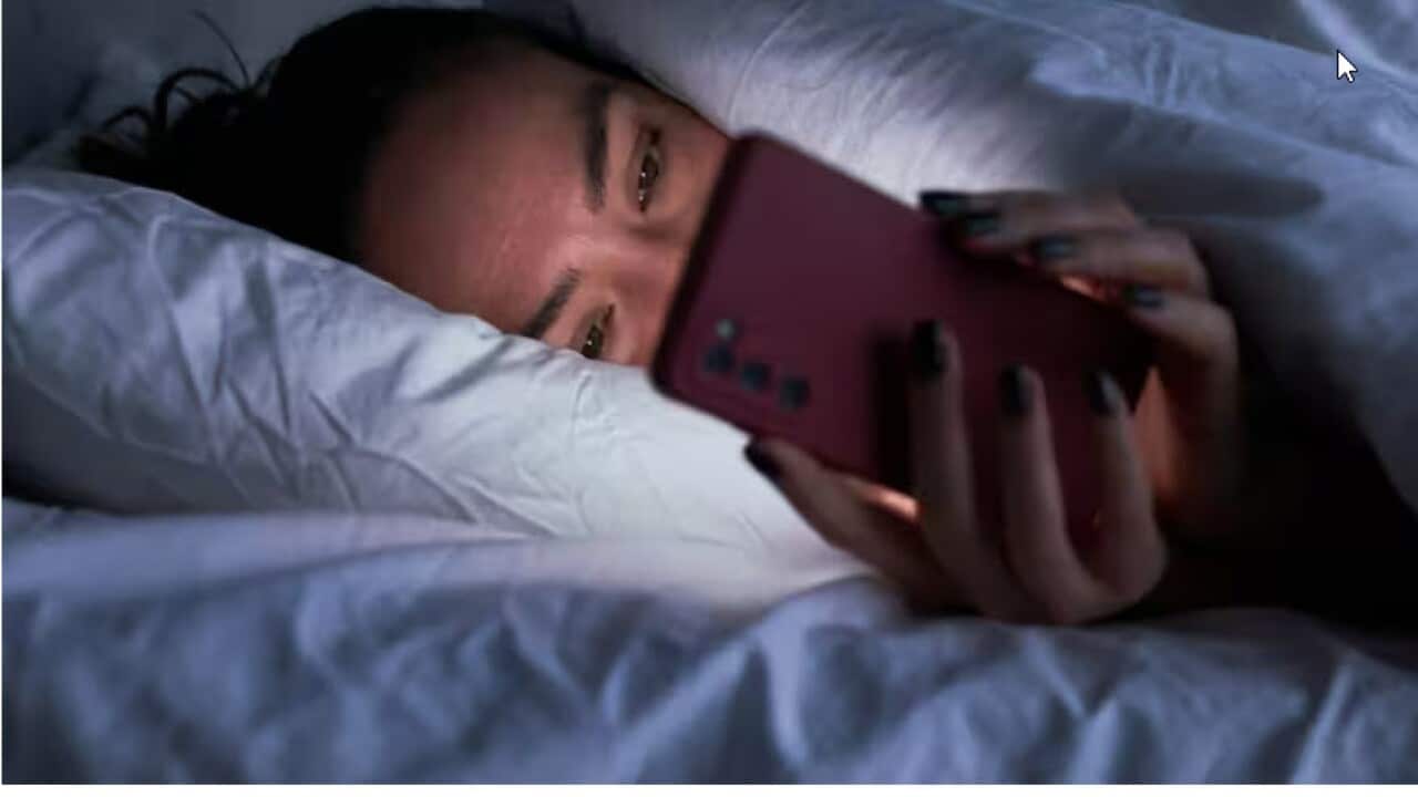 phone on bed.jpg