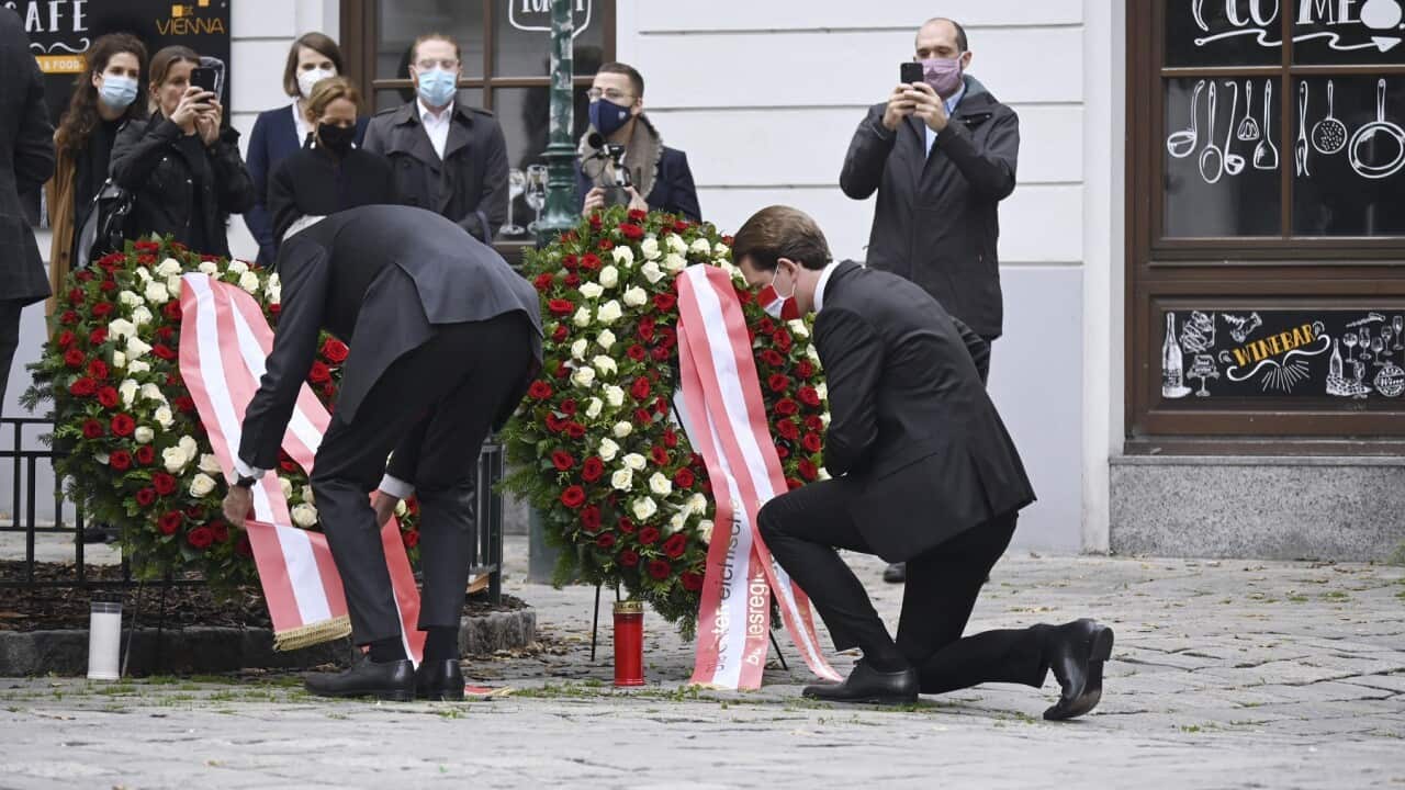 Austrian Chancellor Sebastian Kurz lays a wreath following the attack