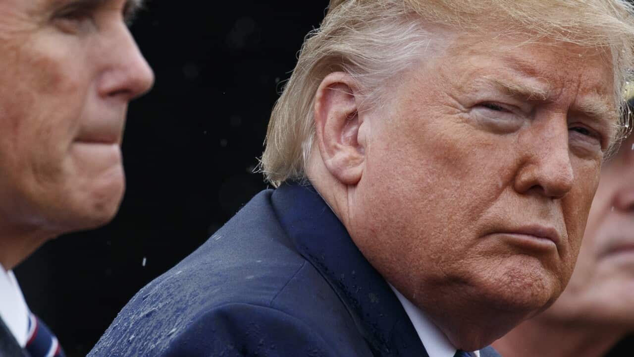 President Donald Trump and Vice President Mike Pence participate in an Armed Forces welcome ceremony for the new chairman of the Joint Chiefs of Staff, Gen. Mark Milley, Monday, Sept. 30, 2019, at Joint Base Myer-Henderson Hall, Va. (AP Photo/Evan Vucci)