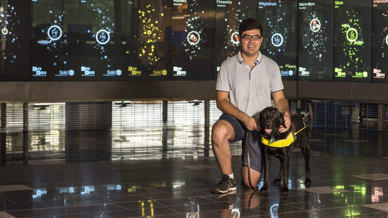 Santi (Electronic Engineering) with Guide Dog at P Block Gardens Point