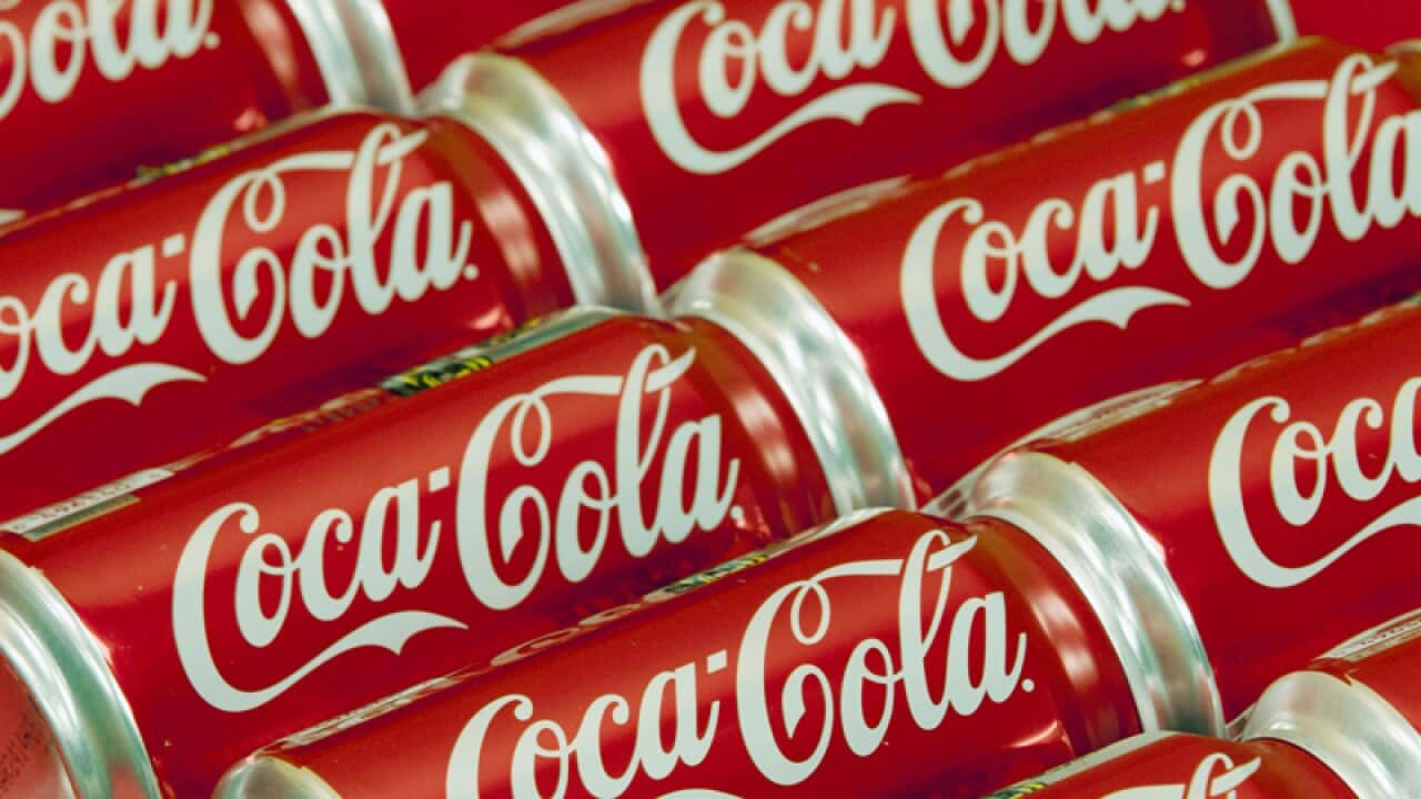 Cans of Coca Cola
