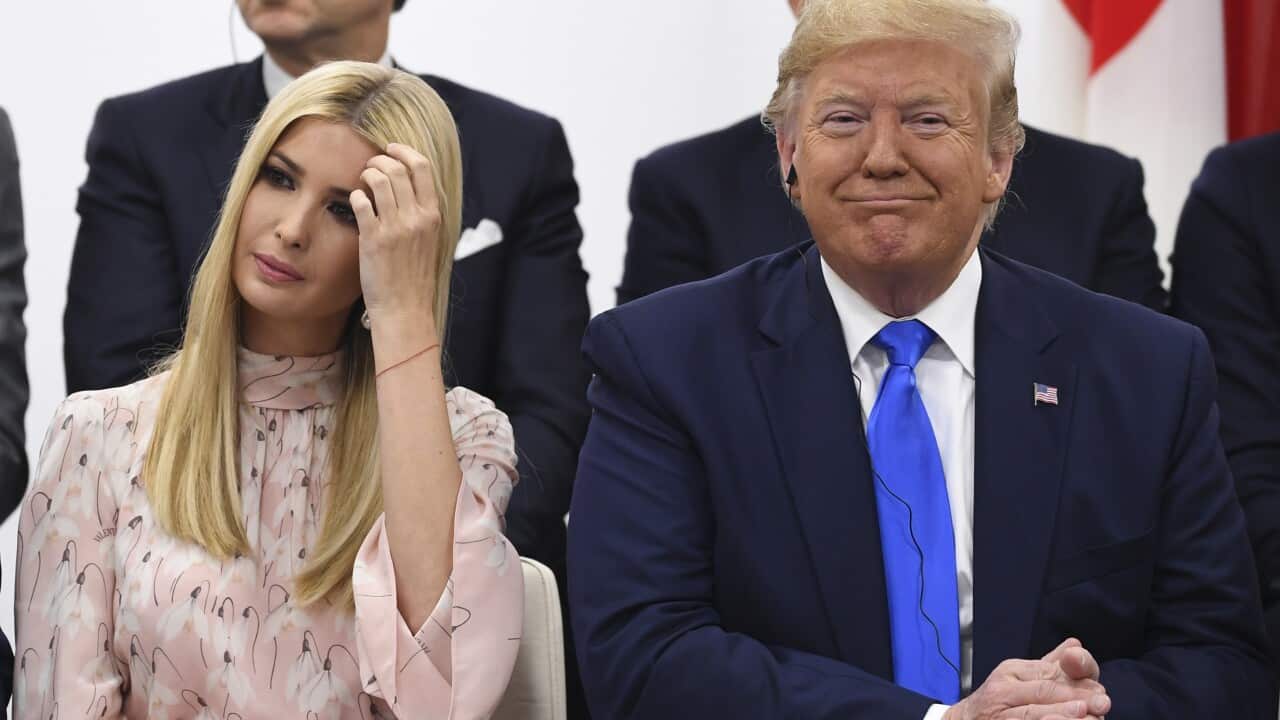 US President Donald Trump seated with his daughter Ivanka.