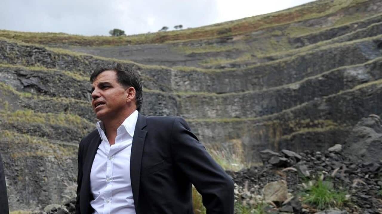 Dial-a-Dump CEO Ian Malouf (right) at a Sydney landfill