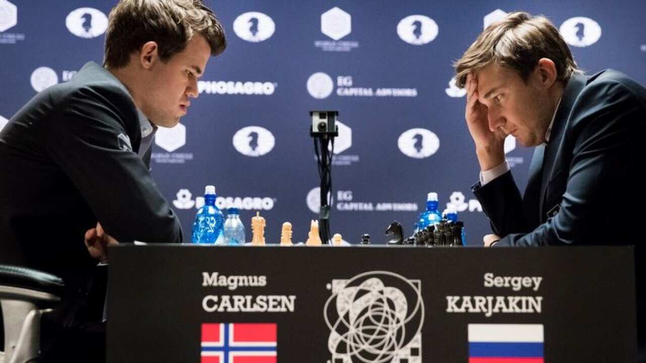 Chess players Magnus Carlsen (L) of Norway, the reigning world chess champion, and Sergey Karjakin, of Russia at World Chess Championship in New York