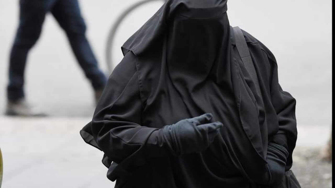 Moutia Elzahed arrives to the Downing Centre court