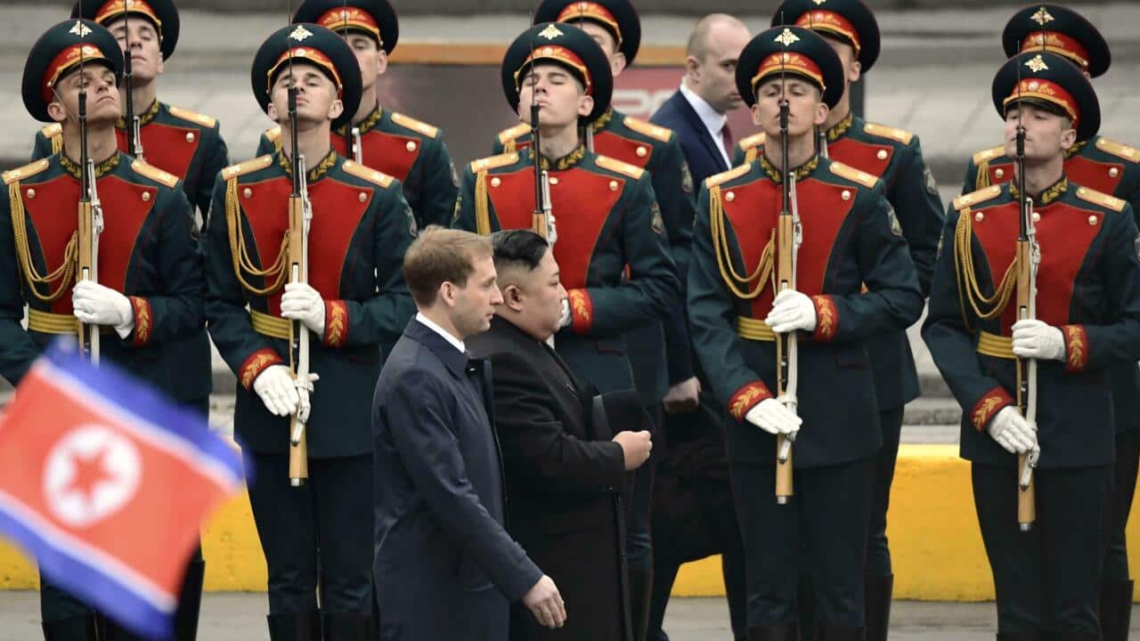 North Korean leader Kim Jong Un (front, R) attends a welcoming ceremony upon arrival at Vladivostok station in Russia on April 24, 2019. He is expected to hold his first talks with President Vladimir Putin the following day. (Kyodo via AP Images) ==Kyodo